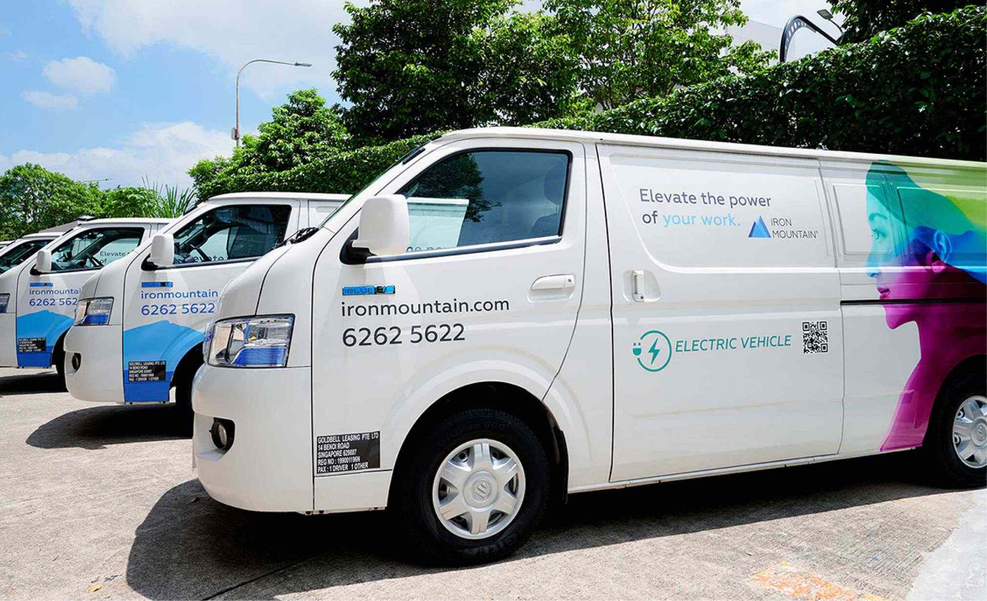Multiple iron mountains vans in parking lot